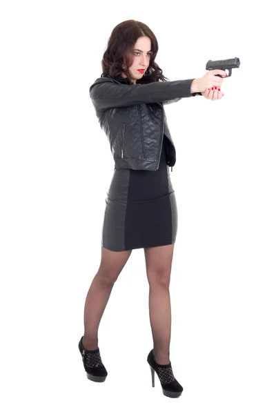 Full length portrait of woman shooting with gun isolated on whit — Stock Photo, Image