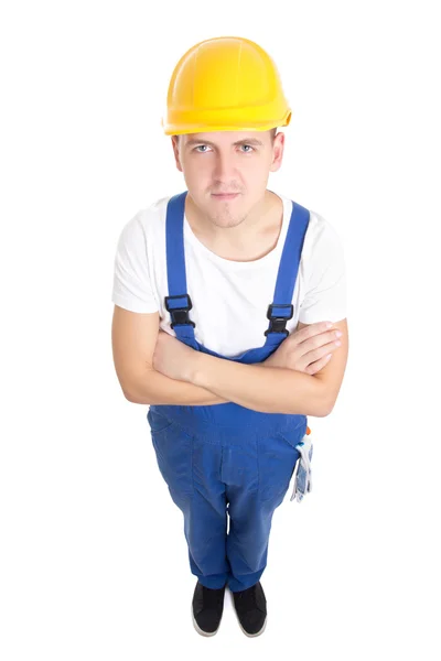 Retrato de comprimento total de construtor de homem bonito no uniforme azul é — Fotografia de Stock