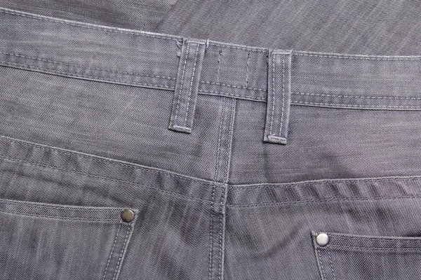 Back side of grey jeans - close up — Stock Photo, Image