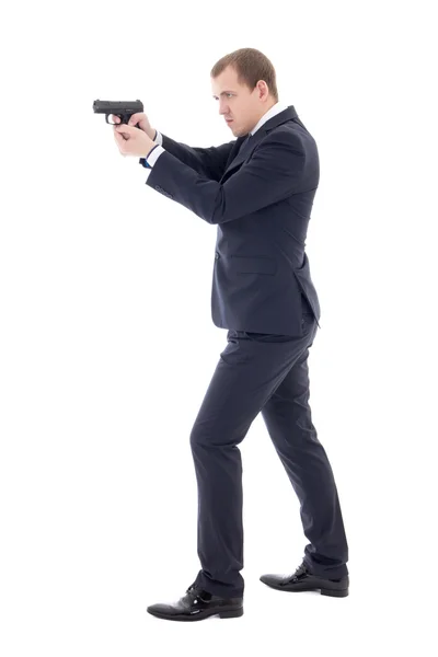 Titkos ügynök férfi öltöny jelentő fegyvert elszigetelt wh — Stock Fotó