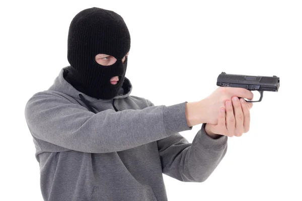 Man in black mask shooting with gun isolated on white — Stock Photo, Image