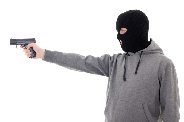 Profile view of man in mask aiming with gun isolated on white — Stock Photo, Image