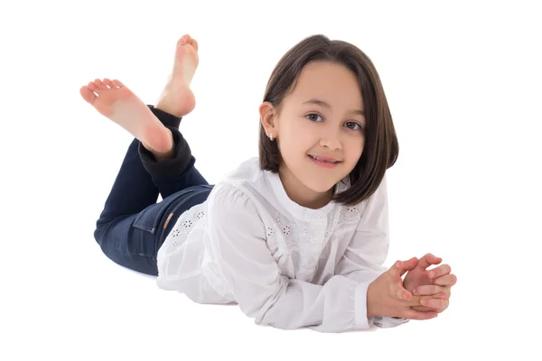 Linda menina, mentindo isolado no branco — Fotografia de Stock