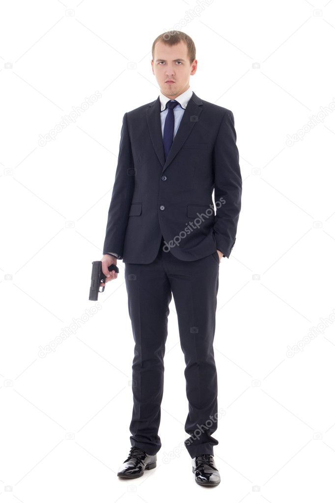 full length portrait of man in business suit with gun isolated o