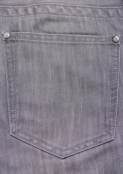 Back pocket of old grey jeans — Stock Photo, Image