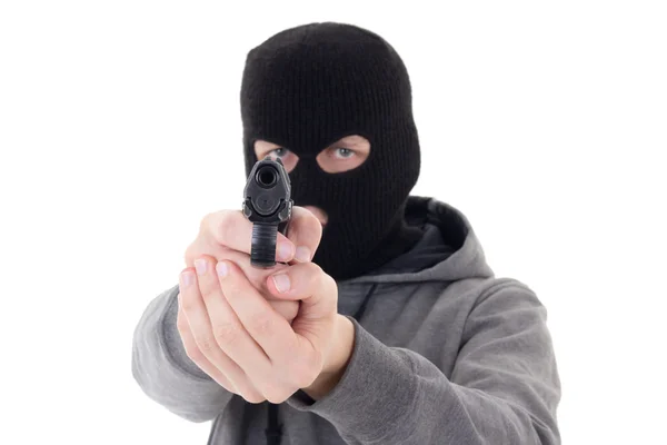 Burglar or terrorist in mask shooting with gun isolated on white — Stock Photo, Image