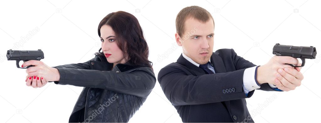 young beautiful woman and man shooting with guns isolated on whi