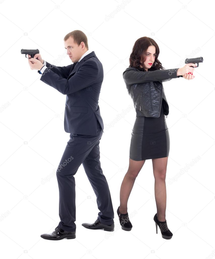 full length portrait of woman and man shooting with guns isolate