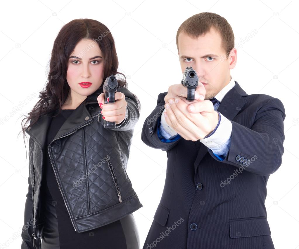 young attractive woman and handsome man posing with gun isolated