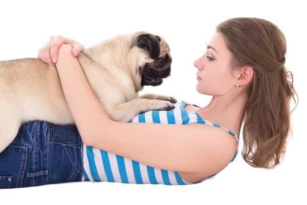 Young woman playing with pug dog isolated on white — Stock Photo, Image