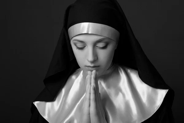 Black and white portrait of young beautiful nun — Stock Photo, Image