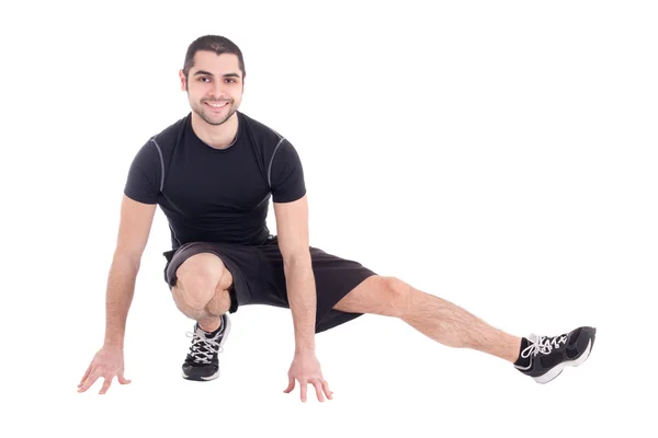 Stilig skäggig arabisk man i sportkläder stretching isolerad på — Stockfoto