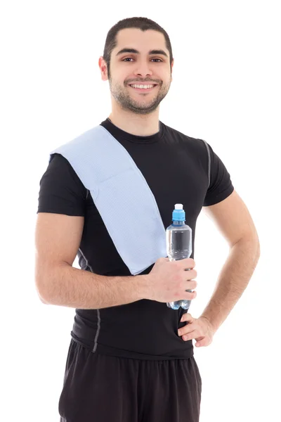 Uomo arabo bello in abbigliamento sportivo con la bottiglia di acqua isolata — Foto Stock