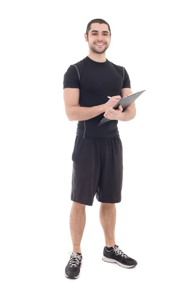 Handsome trainer in sportswear with clipboard isolated on white — Stock Photo, Image