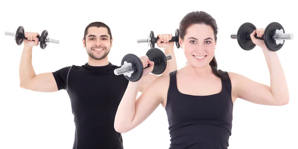 Young man and woman in black sportswear doing exercises with dum — Stock Photo, Image