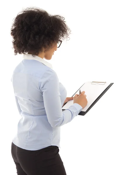 Back view of young beautiful african american woman writing some — Stock Photo, Image