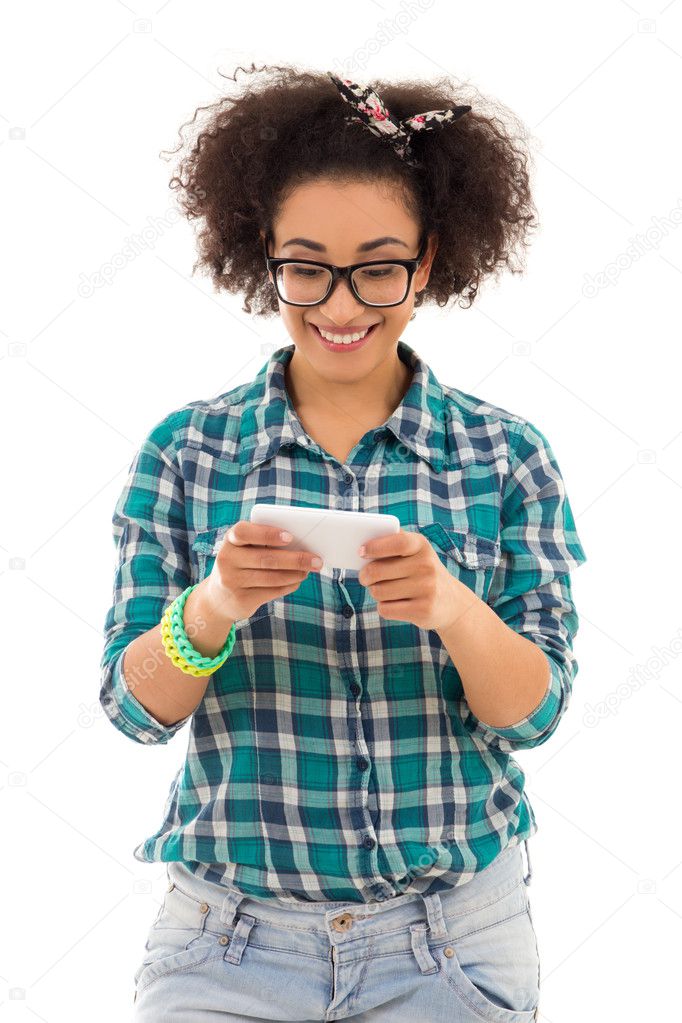 beautiful african american teenage girl texting sms with her pho