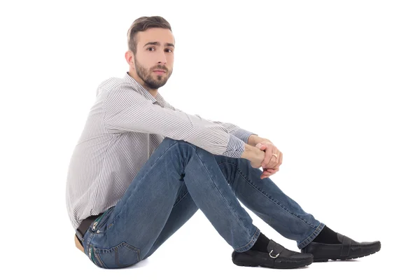 Sitting handsome man isolated on white — Stock Photo, Image