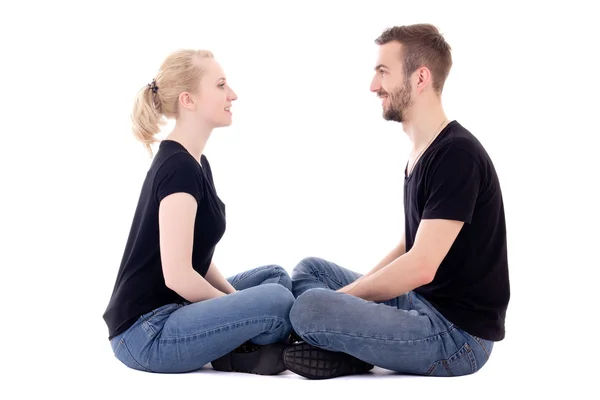 Happy young man and woman looking at each other isolated on whit — Stock Photo, Image