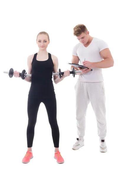 Sportieve vrouw doen oefeningen met personal trainer geïsoleerd op w — Stockfoto