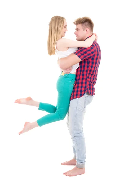 First love concept - young man holding her girlfriend isolated o — Stock Photo, Image