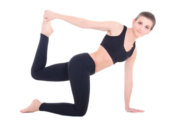 Unga vackra sportiga kvinnan göra stretchingövningar isolerade — Stockfoto
