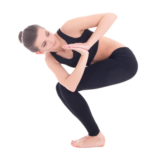 Joven delgada y flexible haciendo yoga aislado en blanco —  Fotos de Stock