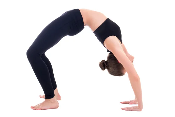 Mujer joven en posición de puente de yoga aislado en blanco —  Fotos de Stock