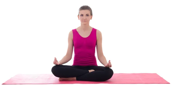 Concepto de deporte-hermosa mujer deportiva delgada haciendo yoga en rosa ma —  Fotos de Stock