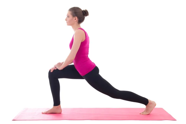 Young beautiful sporty woman doing stretching exercise on yoga m — Stock Photo, Image