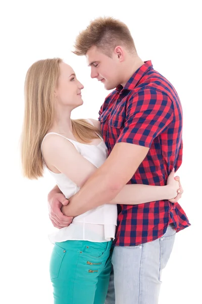 Eerste liefde concept - jonge man en vrouw knuffels geïsoleerd op wit — Stockfoto