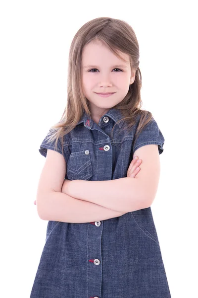 Drôle mignonne petite fille en robe denim avec les mains croisées isoler — Photo