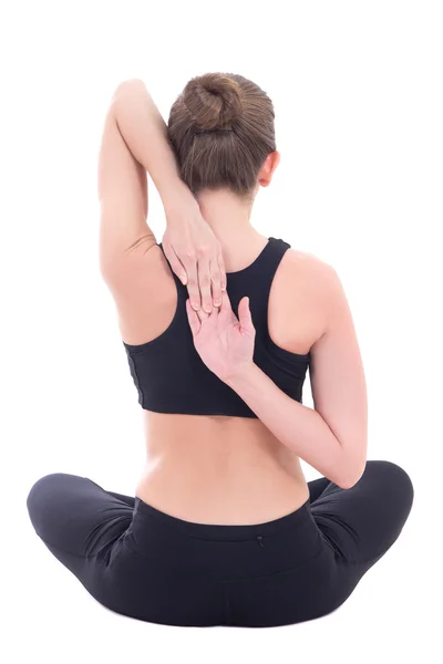 Back view of slim woman sitting in yoga pose isolated on white — Stock Photo, Image