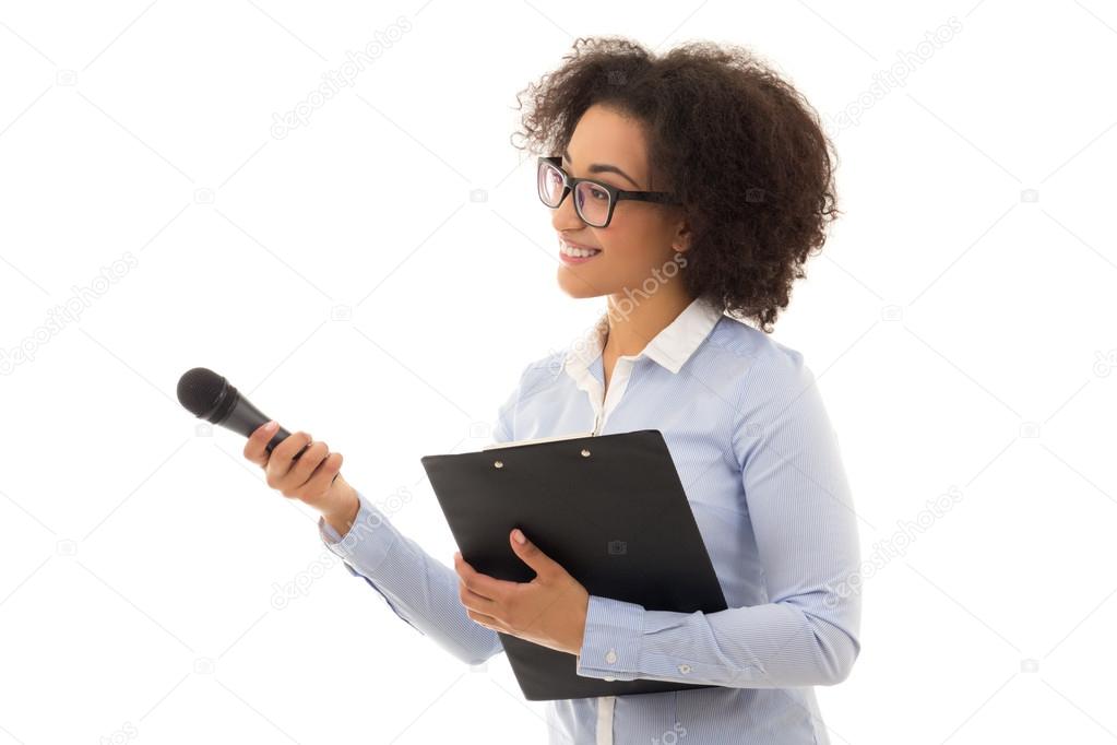african american female reporter with microphone and clipboard i