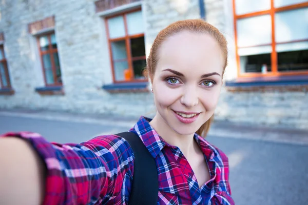 Beautiful student or school girl making selfie photo — Stock Photo, Image