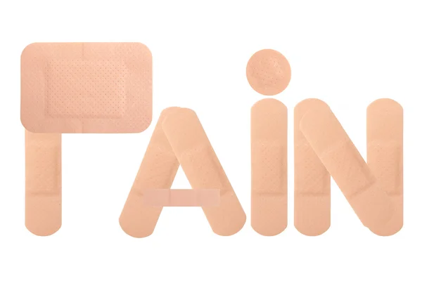 Health care concept - word "pain" written with adhesive bandages — Stok Foto