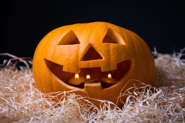 Halloween pumpkin Jack-O-Lantern se svíčkami — Stock fotografie