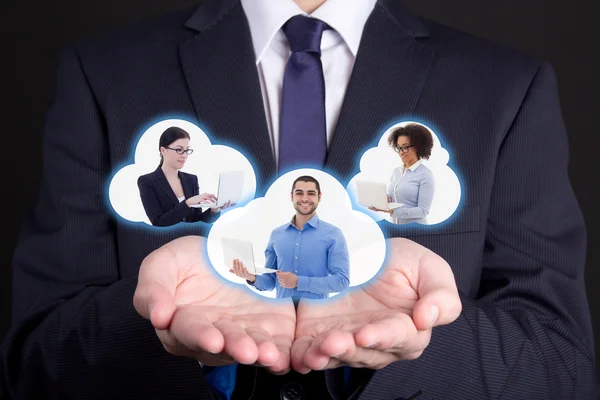 International business concept - clouds with business people in — Stock Photo, Image