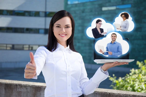 Internet commerce concept - happy business woman with laptop and — Stock Photo, Image