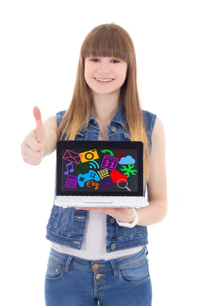 カラフルなメディア アイコンとアプリケーションのラップトップを保持している 10 代の少女 — ストック写真