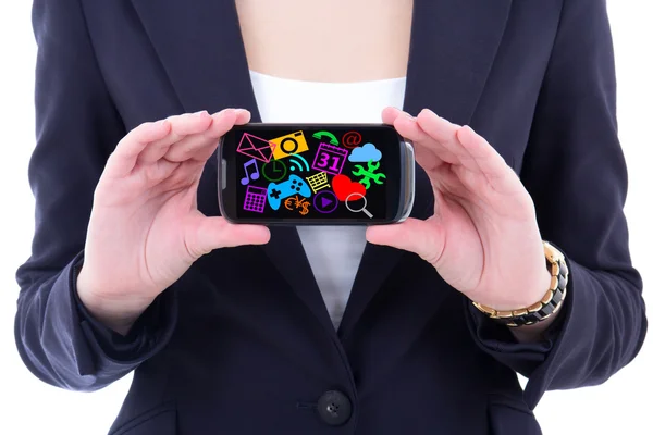 Мобильный телефон с с икон массовой информации и приложений в девушки га — стоковое фото