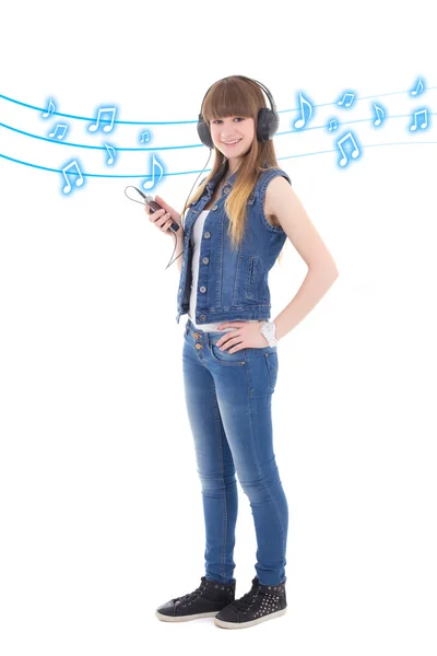 Beautiful teenage girl listening music with mobile phone over wh — Stock Photo, Image