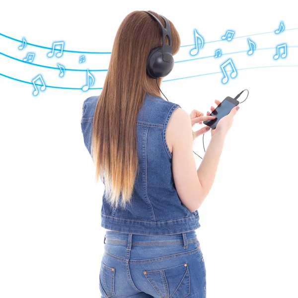 Back view of woman listening music with mobile phone over white — Stock Photo, Image
