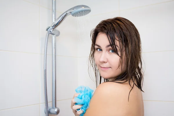 Hygiene concept - young woman washing her body in shower — Stock Photo, Image