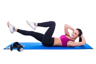 Güzel ince kadının karın kasları Isola için egzersizler yapması