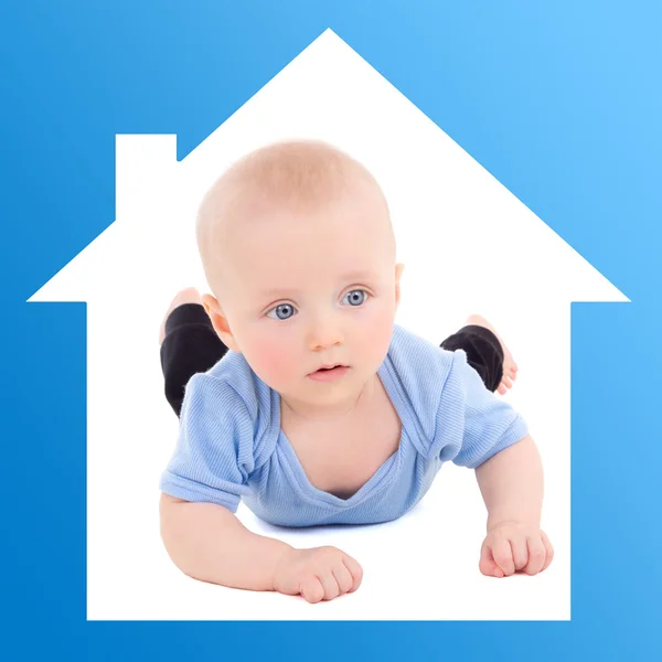 Home and family concept - baby boy in blue house — Foto Stock