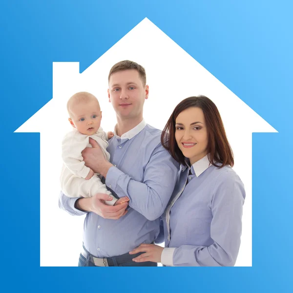 Home and family concept - father, mother and son in blue house — Stockfoto