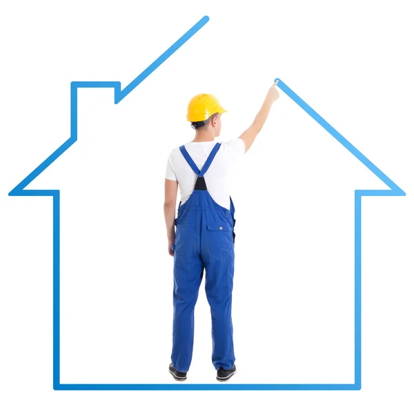 Construction concept - man in blue builder uniform drawing house — Fotografia de Stock