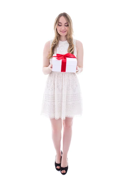 Beautiful young woman in dress with gift box isolated on white — Stock Photo, Image