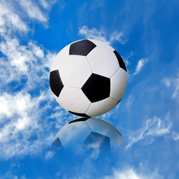 Ball soccer ball against the blue sky — Stock Photo, Image